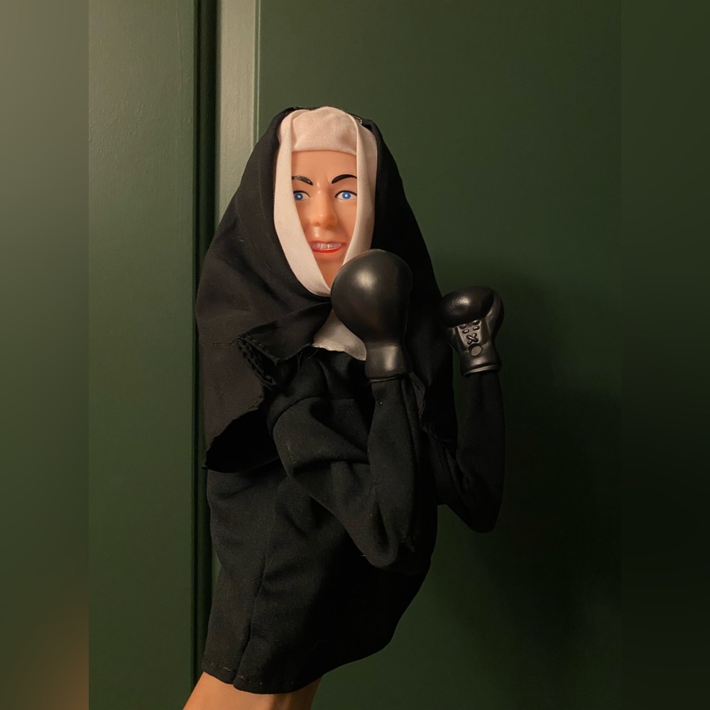 The Fighting Nun vintage punching nun hand puppet
